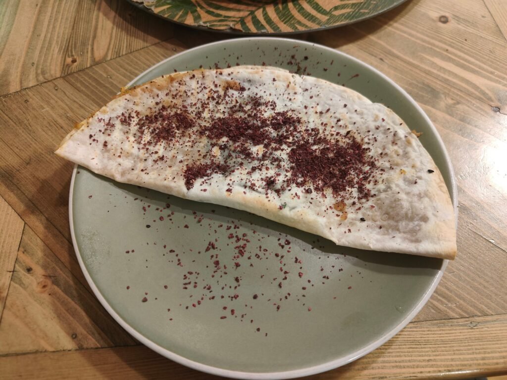 Vegetarian kutab with sumac in Baku, vegetarian food in Azerbaijan