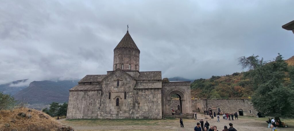 Tatev Monastery on a cloudy day, the main stop of a Tatev day trip from Yerevan